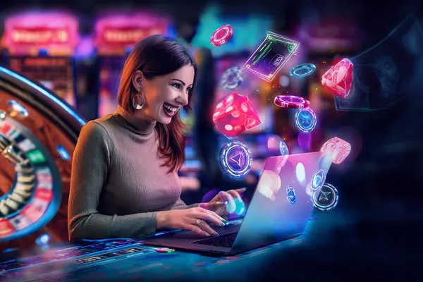 A woman smiling while playing online games on her laptop, surrounded by neon casino elements, showcasing 77ABC’s diverse game collection.